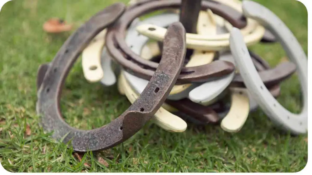 a pile of horseshoes on the grass